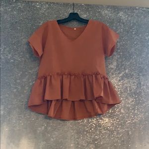 High low burnt orange loose fit peplum top